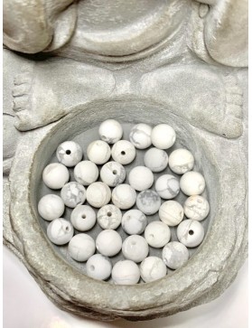 HOWLITE Perles mate 6mm origine Etats-unis (à l'unité)